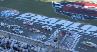 Cleetus McFarland spins tires, causes stack-up on restart at Charlotte